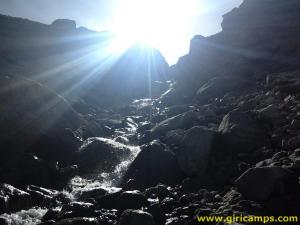 Sunrays through mountains on the way to Giri Camps